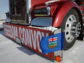 A truck convoy of anti-COVID-19 vaccine mandate demonstrators continue to block the highway at the busy U.S. border crossing in Coutts, Alta., Wednesday, Feb. 2, 2022.