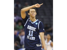 Rhode Island guard Jeff Dowtin (11) signals to fans after scoring against Creighton during a first-round game in the NCAA college basketball tournament in Sacramento, Calif., Friday, March 17, 2017. Rhode Island won 84-72. The Toronto Raptors have signed the guard to a two-way contract.THE CANADIAN PRESS/AP-Steve Yeater