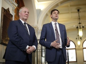 B.C. Attorney General David Eby (right) and then-federal minister of border security and organized crime reduction Bill Blair speak to media following a meeting to discuss money laundering at the Legislature in Victoria on Wednesday, March 27, 2019.
