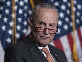 Senate Majority Leader Chuck Schumer, D-N.Y., arrives to meet with reporters after a bill designed to encourage more semiconductor companies to build chip plants in the United States passed the Senate, at the Capitol in Washington, Wednesday, July 27, 2022. The $280 billion measure, which awaits a House vote, includes federal grants and tax breaks for companies that construct their chip facilities in the U.S.