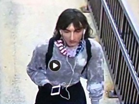 An image from surveillance footage shows a person who police say is Robert Crimo III dressed in women's clothing. Crimo is accused of killing seven people in the Highland Park, Illinois, mass shooting that took place at a parade on July 4, 2022.