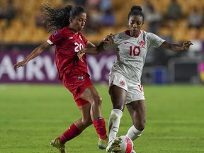 Panama's Schiandra Gonzalez, left, and Canada's Ashley Lawrence fight for the ball during a CONCACAF Women's Championship soccer match in Monterrey, Mexico, Friday, July 8, 2022.