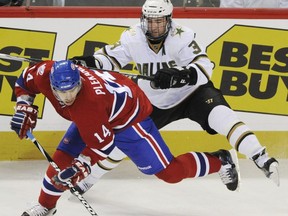 Montreal Canadiens' Tomas Plekanec, left, collides with Dallas Stars' Stephane Robidas during second period NHL hockey action in Montreal, Thursday, Jan., 14, 2010. The Canadiens have named former NHL defenceman Robidas as an assistant coach on Martin St. Louis' staff.
