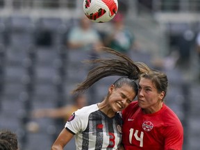 A rock in the heart of the defence and an aerial threat at the end of the pitch, centre back Vanessa Gilles has become an important member of the Canadian women's soccer team. Canada's Gilles (14) and Costa Rica's Maria Paula Coto fight for the ball during a CONCACAF Women's Championship soccer match in Monterrey, Mexico, Monday, July 11, 2022.