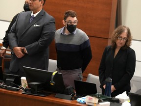 Marjory Stoneman Douglas High School shooter Nikolas Cruz stands and looks towards the gallery of people in the courtroom for the penalty phase of his trial at the Broward County Courthouse in Fort Lauderdale, Florida, U.S. July 18, 2022.