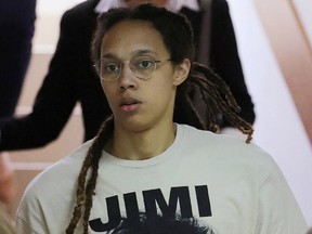 U.S. basketball player Brittney Griner is escorted before a court hearing in Khimki outside Moscow, Russia July 1, 2022.