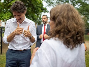 Prime Minister Justin Trudeau meets with families and children from the Dovercourt Boys and Girls club, in Toronto on July 5, 2022.