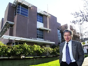 Dr. Brian Day stands outside the Cambie Surgery Centre in Vancouver, in 2002.