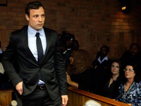 South African athlete Oscar Pistorius appears in Pretoria Magistrates Court for an indictment hearing on August 19, 2013 in Pretoria, South Africa.