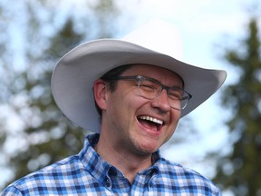 Pierre Poilievre, seen at a July 9, 2022 Calgary Stampede barbecue, has received impressive grassroots support in his bid for leadership of the Conservative Party of Canada, writes Rex Murphy. But he is certainly not without his critics.