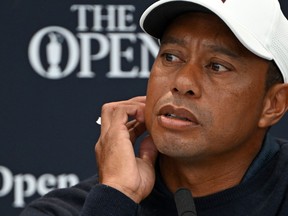 Tiger Woods at a press conference ahead of The 150th British Open Golf Championship on The Old Course at St Andrews in Scotland on July 12, 2022. (Photo by Paul ELLIS / AFP)