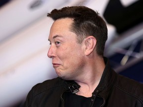 Elon Musk, founder of SpaceX and chief executive officer of Tesla Inc., arrives at the Axel Springer Award ceremony in Berlin, Germany, on Tuesday, Dec. 1, 2020.