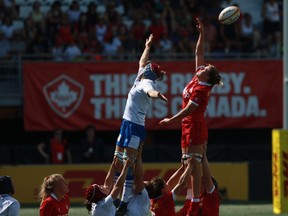 Team Canada and Team Italy battle for the ball during first half test match rugby action at Starlight Stadium in Langford, B.C., on Sunday, July 24, 2022.