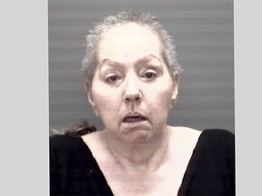 This photo provided by the Eaton County Sheriff's Office shows Beverly McCallum, who is accused in the 2002 fatal bludgeoning of her husband in Michigan, and has been ordered held on a $10 million bond following her return to the U.S. from Italy. McCallum was arraigned on charges of second-degree murder and disinterment/mutilation of a body, the Eaton County sheriff's office said Monday July 11, 2022. McCallum had been in custody in Rome since February 2020. (Eaton County Sheriff's Office via AP)