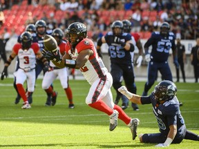 Ottawa Redblacks linebacker Avery Williams (42) attempts to intercept a throw during first quarter CFL action against the Toronto Argonauts, in Toronto on Sunday July, 31, 2022.