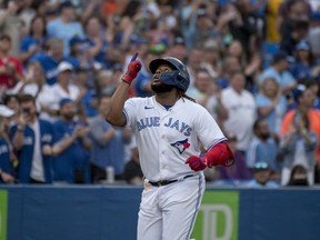 Toronto Blue Jays first baseman Vladimir Guerrero Jr. (27) celebrates after his home run during fourth inning interleague MLB action against the Philadelphia Phillies in Toronto on Wednesday, July 13, 2022.