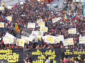 Students shout anti government slogans during protest march in Colombo, Sri Lanka, Friday, July 8, 2022.
