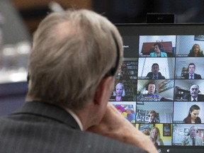 Canadian Members of Parliament are shown on a monitor during a virtual session of the House of Commons Tuesday April 28, 2020 in Ottawa.