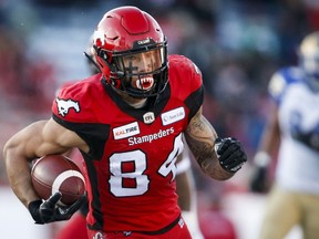 Calgary Stampeders' Reggie Begelton runs in a touchdown during CFL West Semifinal football action against the Winnipeg Blue Bombers, in Calgary, Sunday, Nov. 10, 2019. He's one of the CFL's top receivers, but Begelton can catch more than just footballs.THE CANADIAN PRESS/Jeff McIntosh