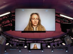 Katerina Tikhonova, deputy director at the mathematical research of complex systems at Moscow State University,  speaks via video link during a panel session on day three of the St. Petersburg International Economic Forum in St. Petersburg, 2021.
