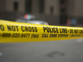 Police tape is shown in Toronto Tuesday, May 2, 2107. THE CANADIAN PRESS/Graeme Roy