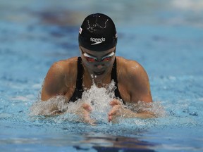 Canada's Kayla Sanchez swims during 100 meters individual medley during World Swimming Championships in Abu Dhabi, United Arab Emirates, Saturday, Dec. 18, 2021. Sanchez, a relay Olympic medallist for Canada, has switched countries to represent the Philippines.