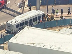 In this image taken from video provided by ABC7 Los Angeles is the scene where a shuttle bus at Los Angeles International Airport crashed and at least two people were seriously injured in Los Angeles, Thursday, July 21, 2022. The Los Angeles Fire Department says there were 30 people on board the bus but the majority of the passengers were not hurt. (ABC7 Los Angeles via AP)