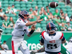 Montreal Alouettes quarterback Trevor Harris (7) throws against Saskatchewan Roughriders during first half CFL football action in Regina on Saturday, July 2, 2022. Harris is among three players to be named the top performers for Week 7 of the CFL season.