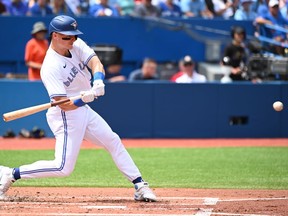 Toronto Blue Jays' Matt Chapman hits a two-run home run also scoring Teoscar Hernandez in the second inning of American League baseball action against the Detroit Tigers in Toronto, Sunday, July 31, 2022.