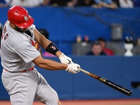 St. Louis Cardinals' Albert Pujols hits a three-run home run against the Toronto Blue Jays in the fifth inning of interleague MLB baseball action in Toronto, Wednesday, July 27, 2022.