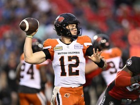 BC Lions quarterback Nathan Rourke (12) throws the ball during first half CFL football action against the Ottawa Redblacks in Ottawa on Thursday, June 30, 2022.