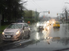 Environment Canada has issued severe thunderstorm warning with a possibility of strong wind gusts, large hail and heavy rain for parts of southern British Columbia. Traffic moves through heavy rains in Vancouver, Wednesday, Jan. 12, 2022. The region is experiencing an atmospheric river.