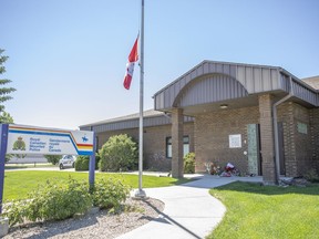 A makeshift memorial is laid out beside the Indian Head RCMP detachment in Indian Head, Sask., Sunday, June 13, 2021. The memorial is laid out for for Const. Shelby Patton who was killed while on duty in Wolseley, Sask.