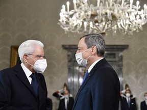 FILE - Italy's President Sergio Mattarella, left, greets Italy's Prime Minister Mario Draghi at the Quirinale presidential palace in Rome, Friday, Nov. 26, 2021, ahead of the French President visit. Draghi met Monday, July 11, 2022 with Italy's president to discuss the future of his government amid simmering tensions with coalition member 5-Star Movement.