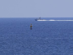 FILE - An Israeli Navy vessel patrols in the Mediterranean Sea, while Lebanon and Israel are being called to resume indirect talks over their disputed maritime border with U.S. mediation, off the southern town of Naqoura, Monday, June 6, 2022. The Israeli military on Saturday, July 2, 2022 said it shot down three unmanned aircraft launched by the Lebanese militant group Hezbollah heading toward an area where an Israeli gas platform was recently installed in the Mediterranean Sea.