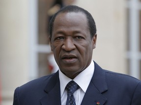 FILE - Burkina Faso President Blaise Compaore speaks to the media after a meeting with France's President Francois Hollande at the Elysee Palace in Paris, Sept. 18, 2012. Compaore, who was ousted in a popular uprising in 2014, returned to Burkina Faso for the first time on Thursday, July 7, 2022.