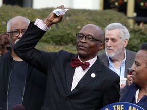 FILE - The Rev. T. Anthony Spearman, then-president of the North Carolina NAACP, crumples up a mailer which tells voters that IDs are needed in the upcoming 2020 election during a news conference outside the Legislative Building in Raleigh, N.C., on Dec. 27, 2019. Spearman, a civil rights advocate and former president of the N.C., branch of the NAACP who also served as president of the N.C. Council of Churches, has been found dead, his attorney said Wednesday, July 20, 2022.