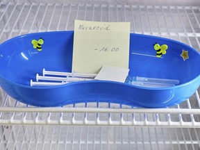 FILE - A kidney dish with syringes containing the Novavax COVID-19 vaccine sits in a refrigerator ready for use at a vaccination center in Prisdorf, Germany, Saturday, Feb. 26, 2022. On Tuesday, July 19, 2022, a U.S. Centers for Disease Control and Prevention advisory panel recommended the shots and final action will come from the agency's director.