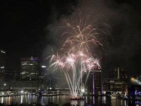 FILE - Fireworks explode over Baltimore's Inner Harbor during the Ports America Chesapeake 4th of July Celebration, Thursday, July 4, 2019, in Baltimore. The city of Baltimore is resuming its Independence Day celebrations after a two-year hiatus.