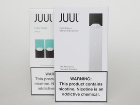FILE - Packaging for an electronic cigarette and menthol pods from Juul Labs is displayed on Feb. 25, 2020, in Pembroke Pines, Fla. The Food and Drug Administration and Juul have agreed to suspend court proceedings while the agency conducts additional review of the company's vaping devices. The agreement Wednesday, July 6, 2022, comes one day after the FDA placed a hold on its initial order banning Juul's products.
