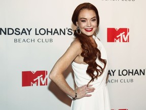 FILE - Lindsay Lohan attends MTV's "Lindsay Lohan's Beach Club" series premiere party at Magic Hour Rooftop at The Moxy Times Square on Jan. 7, 2019, in New York. Lohan is celebrating her 36th birthday on Saturday as a married woman. The "Freaky Friday" star said she was the "luckiest woman in the world" in an Instagram post Friday, July 1, 2022, that pictured her with financier Bader Shammas, who had been her fiance.