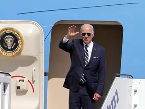 U.S. President Joe Biden waves before his departure to Saudi Arabia from Ben Gurion airport in Lod near Tel Aviv, Israel Friday, July 15, 2022.
