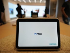 A Meta Portal Go is displayed during a preview of the Meta Store in Burlingame, Calif., Wednesday, May 4, 2022. Facebook and Instagram's parent company Meta posted its first revenue decline in history on Thursday, July 27, 2022 dragged by a drop in ad spending as the economy falters -- and as competition from rival TikTok intensifies.