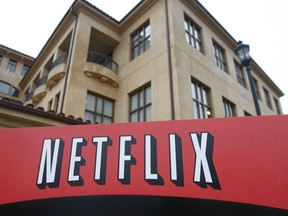 FILE - This photo shows the company logo and view of Netflix headquarters in Los Gatos, Calif., Jan. 29, 2010. Netflix shed almost 1 million subscribers during the spring amid tougher competition and soaring inflation that's squeezing household budgets, heightening the urgency behind the video streaming service's effort to launch a cheaper option with commercial interruptions. The April-June contraction of 970,000 accounts, announced Tuesday, July 19, 2022, as part of Netflix's second-quarter earnings report, is by far the largest quarterly subscriber loss in the company's 25-year history.