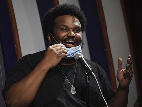 In this April 20, 2020, photo, comedian Craig Robinson performs at the Laugh Factory comedy club in Los Angeles. A man fired a gun inside a comedy club in North Carolina Saturday night, July 16, 2022 shortly after it was evacuated and before actor and comedian Craig Robinson was set to perform, police said. No one was injured. Club employees told WSOC-TV that the man waved a gun around and told everyone to leave before the venue emptied out. About 50 customers had been inside.
