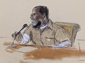 In this courtroom sketch, R. Kelly briefly addresses Judge Ann Donnelly during his sentencing in federal court, Wednesday, June 29, 2022, in New York. R. Kelly was sentenced to 30 years in prison Wednesday for using his superstardom to subject young fans -- some just children -- to systematic sexual abuse.