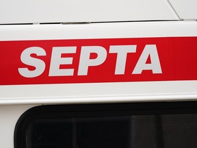 FILE - A Southeastern Pennsylvania Transportation Authority (SEPTA) logo is shown, on Thursday, Dec. 2, 2021. Philadelphia police are looking for a man they say raped a woman on a subway platform while holding her boyfriend at gunpoint early Monday, July 18, 2022. This is the third reported sexual assault since October on a Philadelphia-area commuter train or train platform.