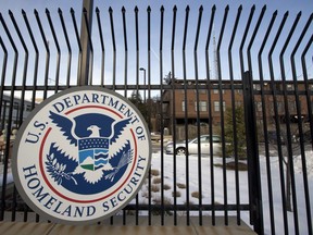 FILE - The U.S. Homeland Security Department headquarters in northwest Washington is pictured on Feb. 25, 2015. A popular Chinese-made automotive GPS tracker used by individuals, government agencies and companies in 169 countries has severe software vulnerabilities, posing a potential danger to life and limb, national security and supply chains, cybersecurity researchers said in a report released Tuesday, July 19, 2022, to coincide with an advisory from the U.S. Cybersecurity and Infrastructure Security Agency listing six vulnerabilities.