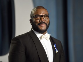FILE - Tyler Perry arrives at the Vanity Fair Oscar Party at the Wallis Annenberg Center for the Performing Arts in Beverly Hills, Calif., Sunday, March 27, 2022. AARP announced Thursday, July 28, 2022, that Perry will receive the honorary AARP Purpose Prize award during a virtual ceremony on Oct. 25. The famed filmmaker-actor-philanthropist will be recognized for his work through The Perry Foundation.