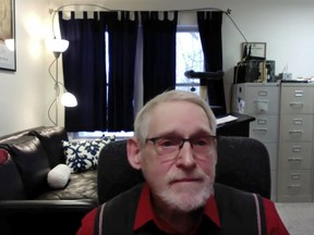 FILE - This image from video provided and taken by Barry Mehler shows Mehler during a 14-minute YouTube video at the start of a new term at Ferris State University. The Michigan professor who was suspended in January 2022 for making a profanity-filled video to welcome students settled his legal dispute with the university by accepting $95,000 and agreeing to a three-year gag order.